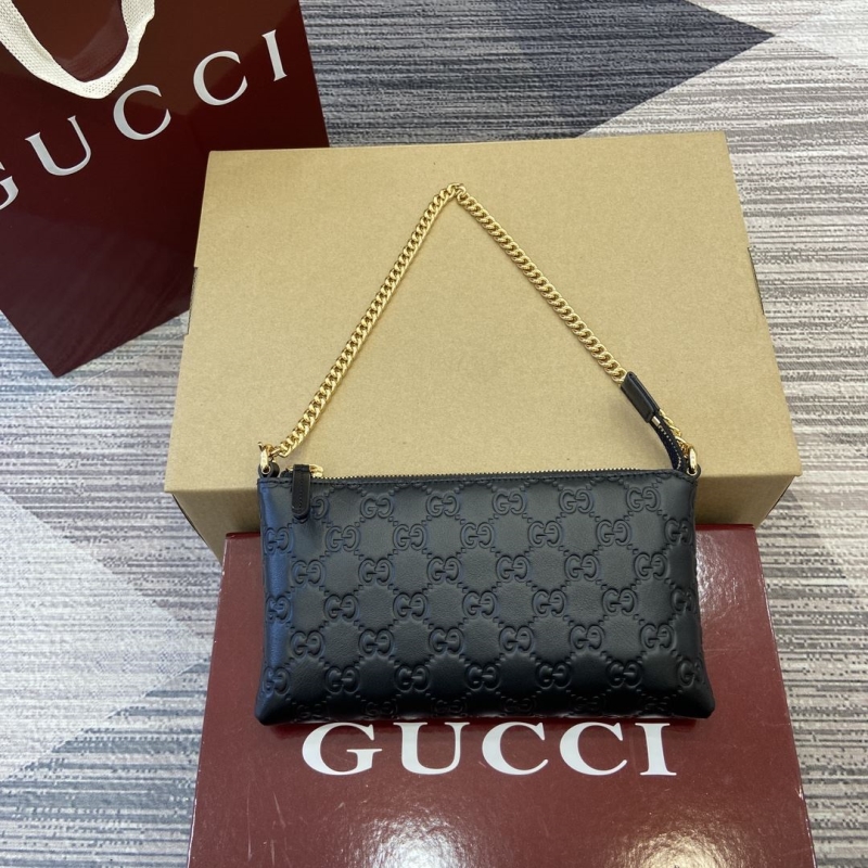 G*u*i top handle bags